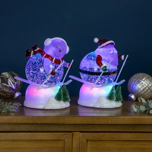 Northlight LED Lighted Color Changing Skiing Santa And Snowman Acrylic Christmas Snow Globes - 7.25" - Set Of 2 1 Northlight LED Lighted Color Changing Skiing Santa And Snowman Acrylic Christmas Snow Globes - 7.25" - Set Of 2